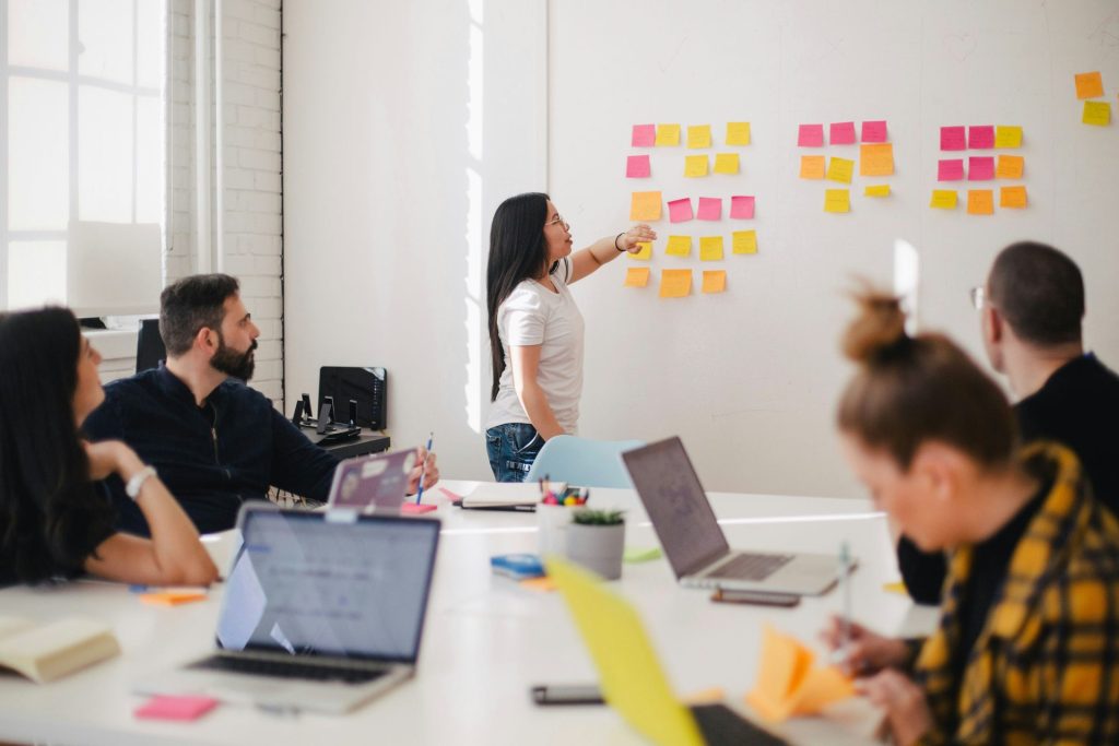 Woman giving a presentation to colleagues